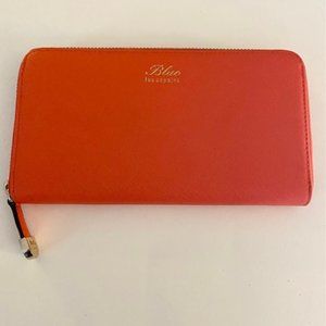Blue Les Copains long leather zip-up wallet in tangerine